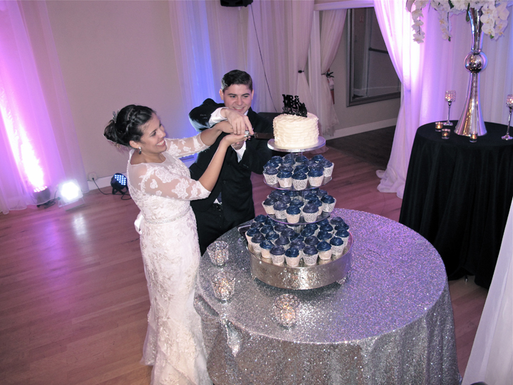 casselberry-crystal-ballroom-wedding-cake-cutting
