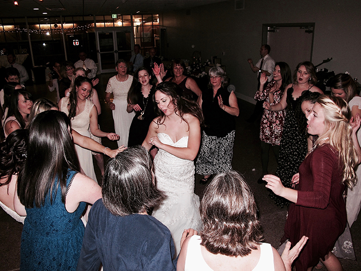 The Bride dancing with her wedding guests during the reception