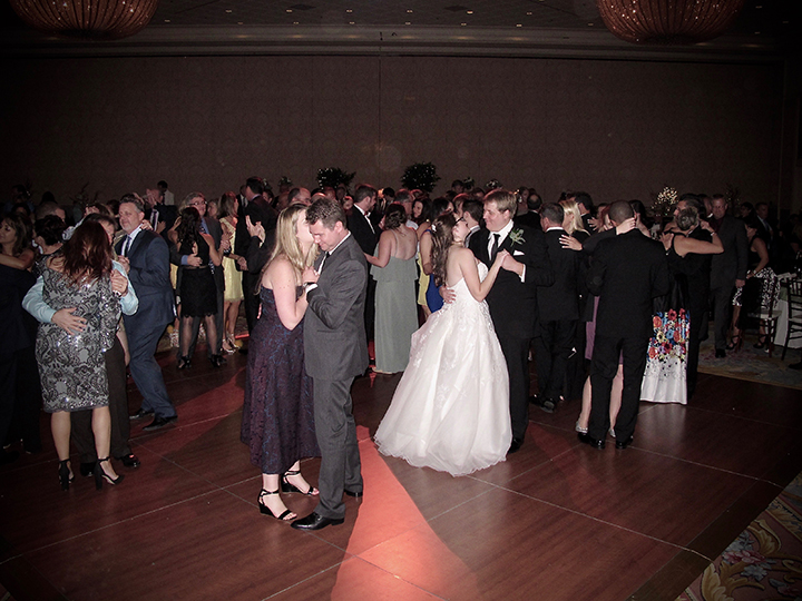 Guests dancing at a Wedding Reception at Walt Disney World's Grand Floridian Ballroom