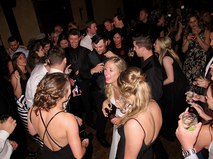 Wedding guests dance the night away with DJ Chuck Johnson at this Dubsdread Ballroom reception.
