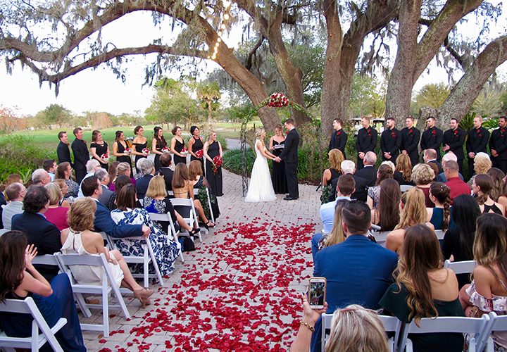 historic dubsdread wedding venue has a ceremony location under the large live oak tree