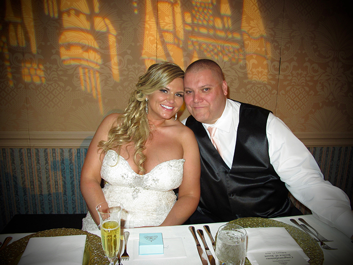 The Wedding couple at their sweetheart table in the St Augustine Ballroom