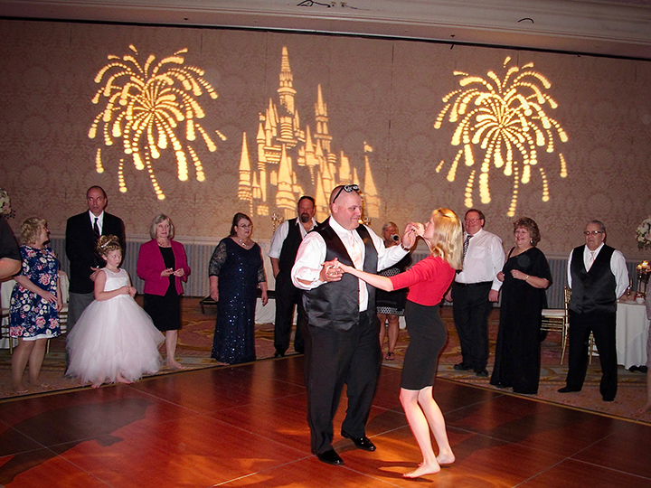 The Groom dances with family and friends at the Walt Disney World wedding reception