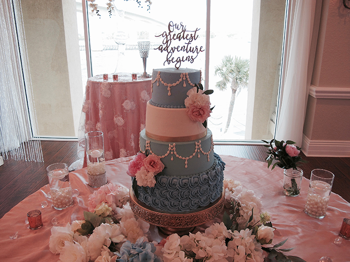 The wedding cake displayed in the Crystal Ballroom Sunset Harbor, located in Daytona Beach.