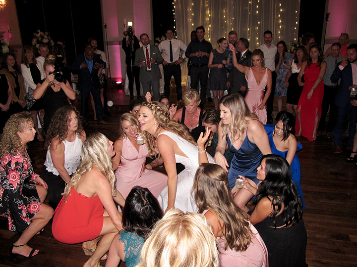 The bride dances with her friends to a great song played by Classic Disc Jockey's DJ Chuck Johnson.