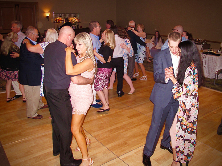 Guests dance as they celebrate the reception at the Orlando World Center Marriott.
