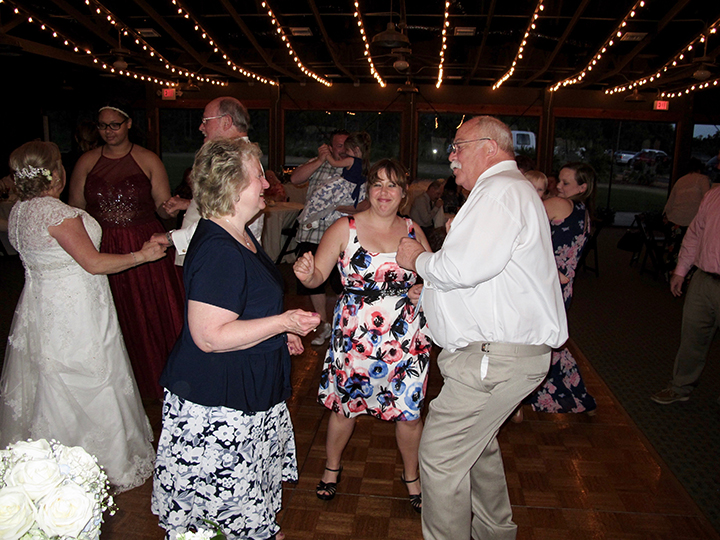 Wedding guests dancing and celebrating with Orlando DJ Chuck from Classic Disc Jockeys.