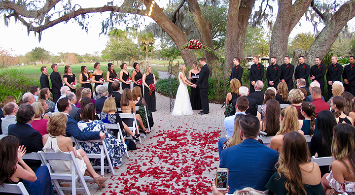 The Orlando Wedding Marketplace presents a wedding ceremony outside at The Dubsdread Ballroom.