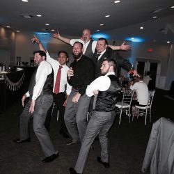 The groom and his buddies have some fun at a Royal Crest Room Wedding with Orlando DJ Chuck Johnson.