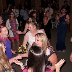 Having fun with family and friends on the dance floor with St Augustine wedding DJ Chuck Johnson