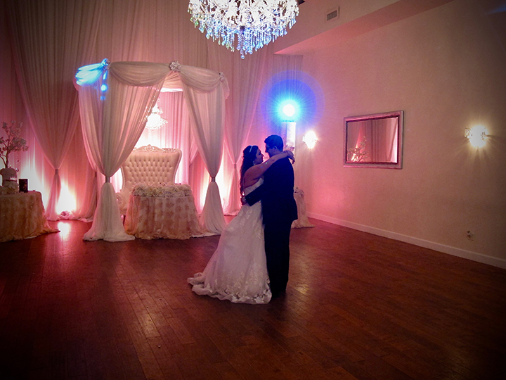 The brida and groom share a Last Dance together at the Crystal Ballroom Veranda in MetroWest.