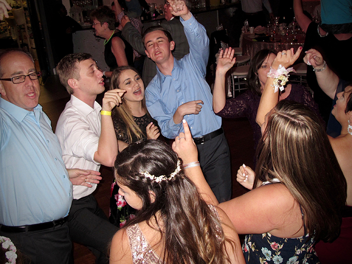 MetroWest DJs help wedding guests celebrate with friends and family.