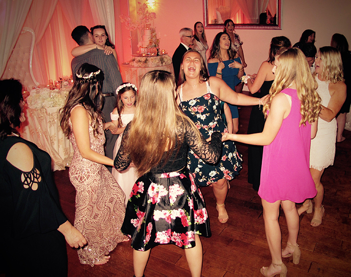 Guests on the dance floor of a Crystal Ballroom at Veranda Wedding.