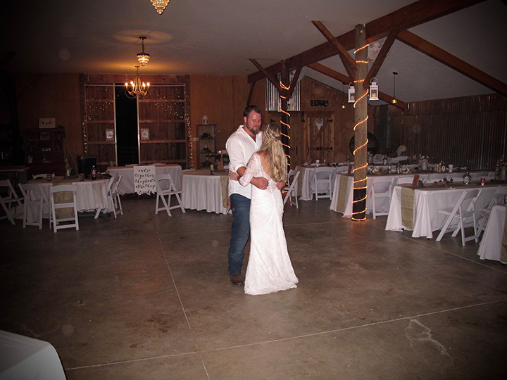This couple shares the dance floor for the last dance of the night at the Red Barn at Bushnell.