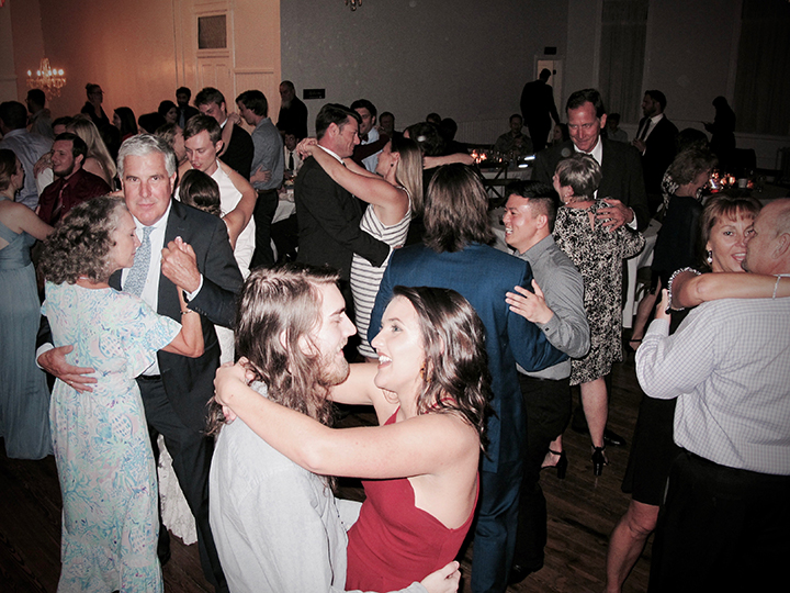The Wedding Reception at Venue 1902 in Sanford has a dance floor full of guests.