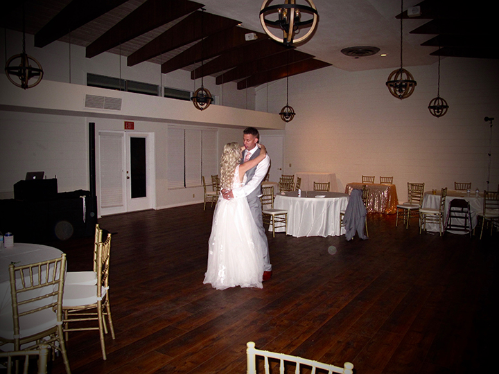 The wedding couple celebrate their last dance at the Florida Federation of Garden Clubs.