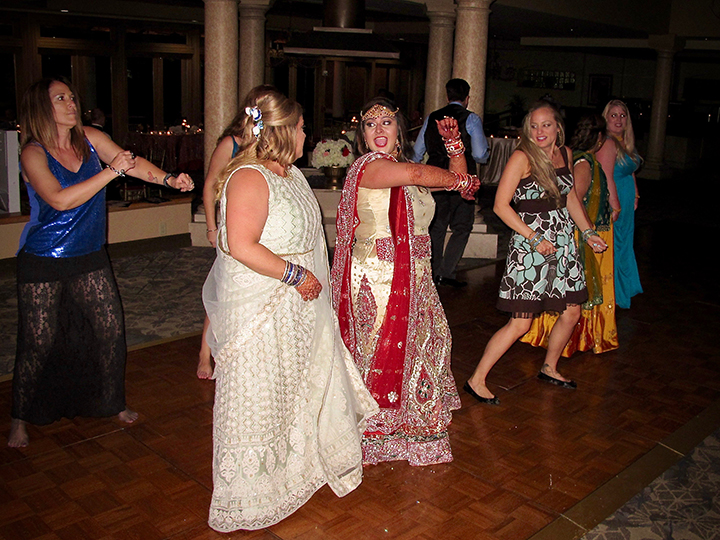 The bride takes to the dance floor with family and friends and Orlando Wedding DJ Chuck Johnson.