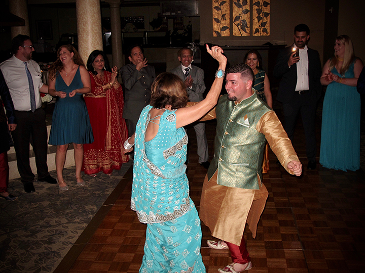 Friends and family on the dance floor at this Mission Inn Wedding.