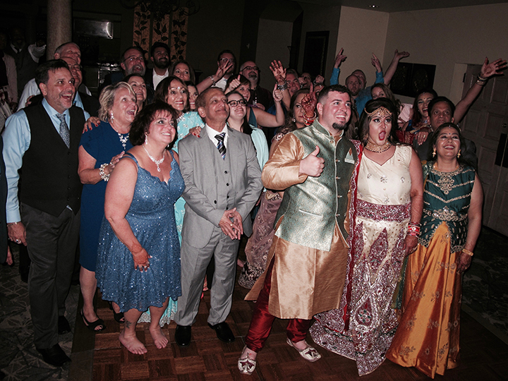 Guests gather on the dance floor for this traditional Hindi Wedding at the Mission Inn Resort.