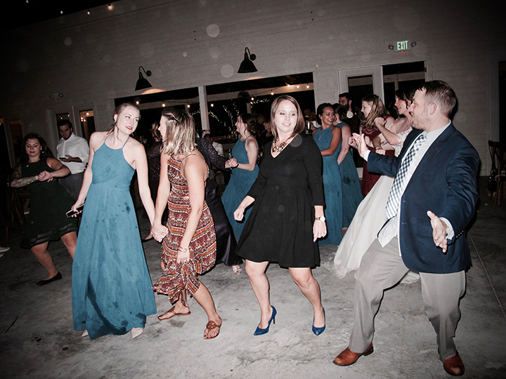 Guests are on the dance floor at this Mulberry at New Smyrna Beach Wedding.