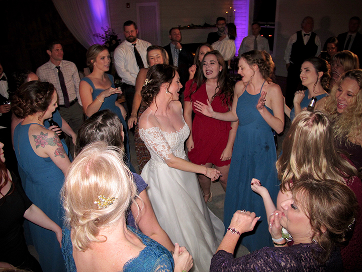 The bride and her guests are having fun at her wedding at the Mulberry at New Smyrna Beach!