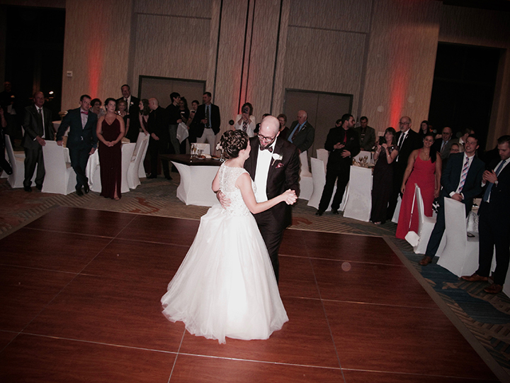 Orlando Wedding DJ Chuck Johnson helps this couple on the dance floor for their first dance.
