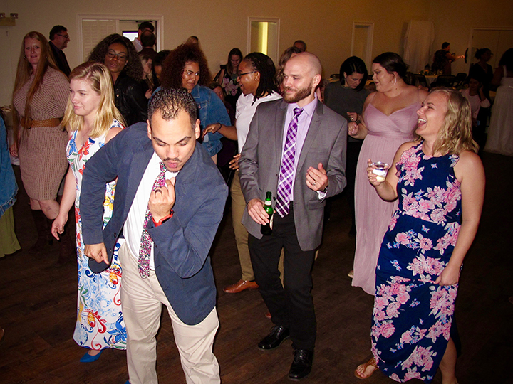 Guests are having fun on the dance floor at this Winter Park Mead Gardens Wedding.