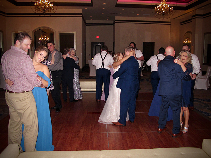 Guests having fun on the dance floor of this Wyndham Grand Resort Bonnet Creek Wedding.