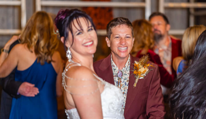 same-sex wedding couple are celebrating their vows with lgbtq-friendly wedding dj chuck johnson