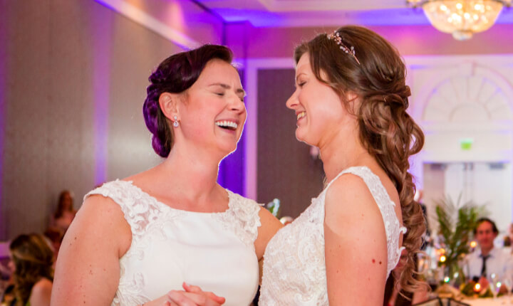 two brides share their first dance at this lgbtq-friendly wedding celebration at the Reunion Resort Wedding Venue