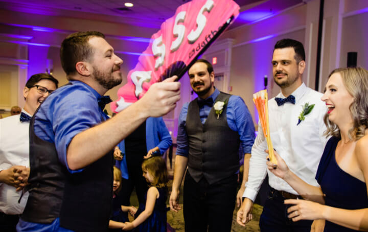 guests art a same-sex wedding reception at leu gardens wedding venue