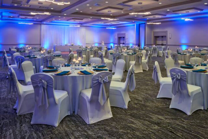 shades of green resort wedding venue interior reception ballroom for couples and their guests