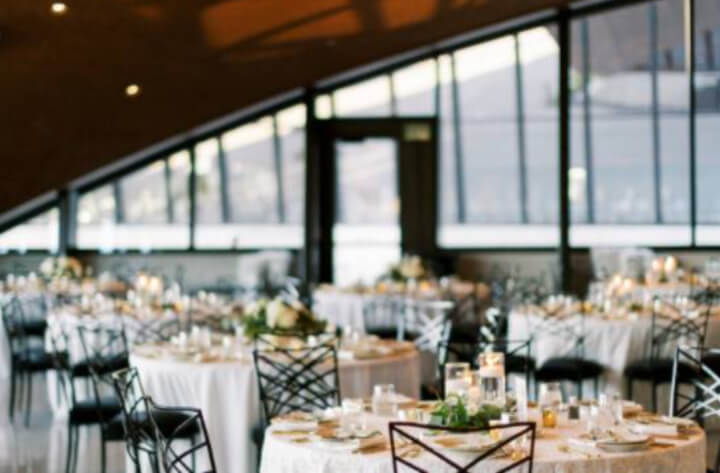 interior view of a wedding reception setup at the Winter Park Events Center Wedding Venue